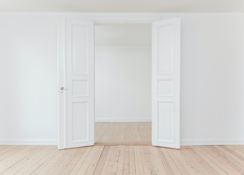 a white room with white doors