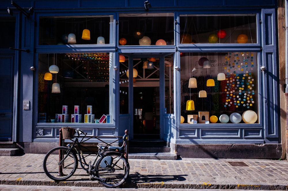 a shop with lots of lights and an bicycle