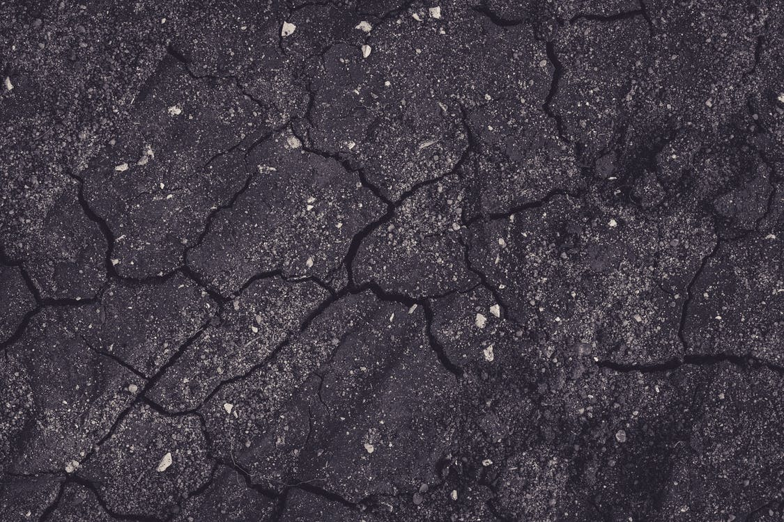 A concrete road with cracks